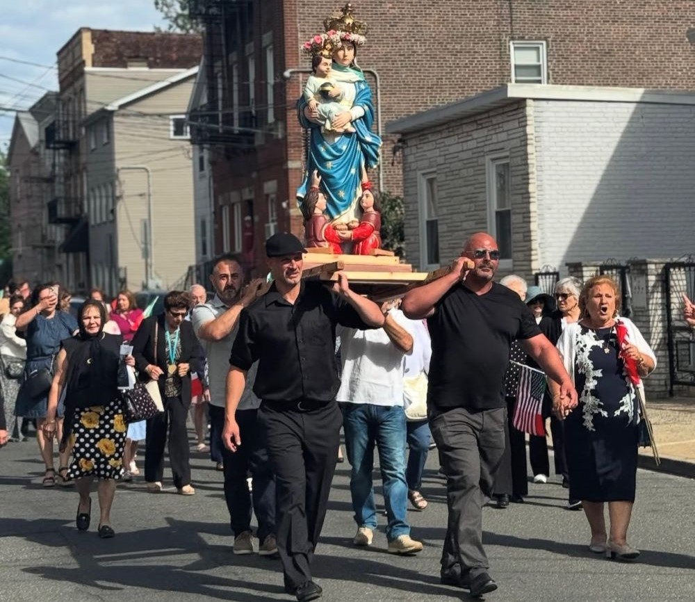 Members of the Newark Italian Apostolate carry the statue of la Madonna della Fontana in Newark.