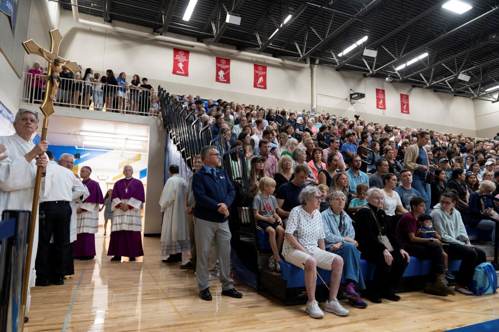Prelates wait to enter a prayer vigil at the Academy of Holy Angels following a shooting earlier in the day at Annunciation Church in Minneapolis Aug. 27. About 2,000 people attended the vigil.  (OSV News/Reuters/Tim Evans)