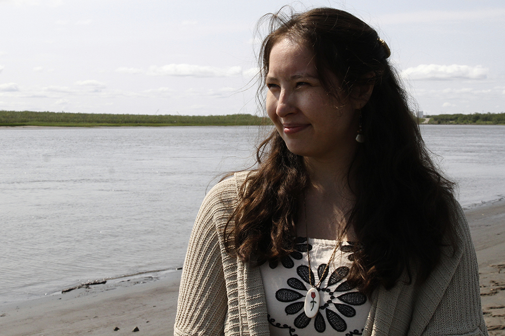Sophie Swope, executive director of the Mother Kuskokwim Tribal Coalition, poses for a portrait on the banks of the Kuskokwim River in Bethel, Alaska, on June 17, 2025. (AP/Mark Thiessen)