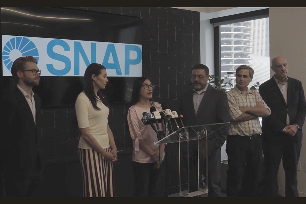 Ana María Quispe Díaz speaks at press conference. 