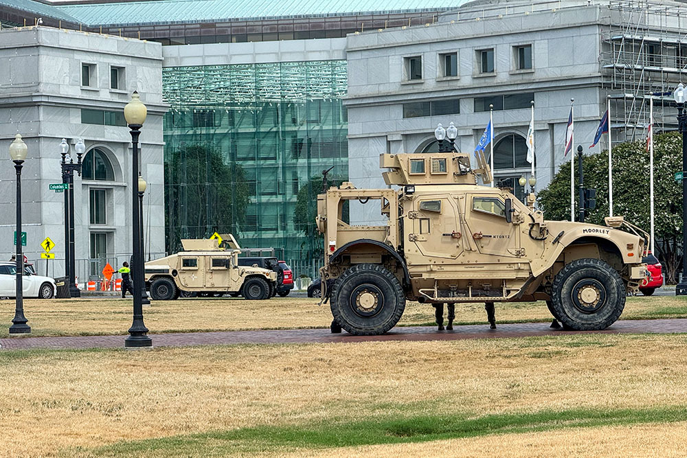 National Guard vehicles and members of the Guard were posted in front of Union Station and the Thurgood Marshall Federal Judiciary Building in Washington, D.C., on Aug. 17, 2025. (NCR photo/H. Betts)