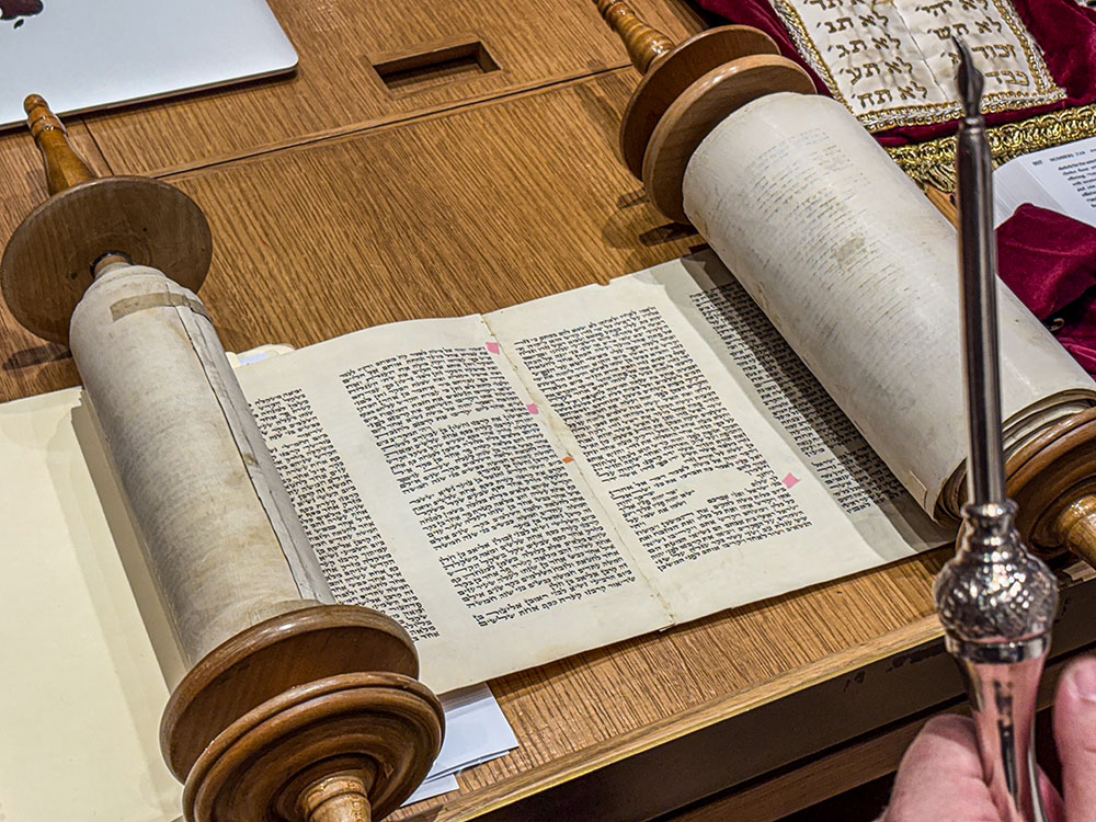 The opened Torah at Park Avenue Synagogue in Manhattan's Upper East Side is displayed for Catholic teachers who gathered in New York for a seminar organized by the Olga Lengyel Institute for Holocaust Studies and Human Rights in New York, July 25, 2025. (NCR photo/Camillo Barone)