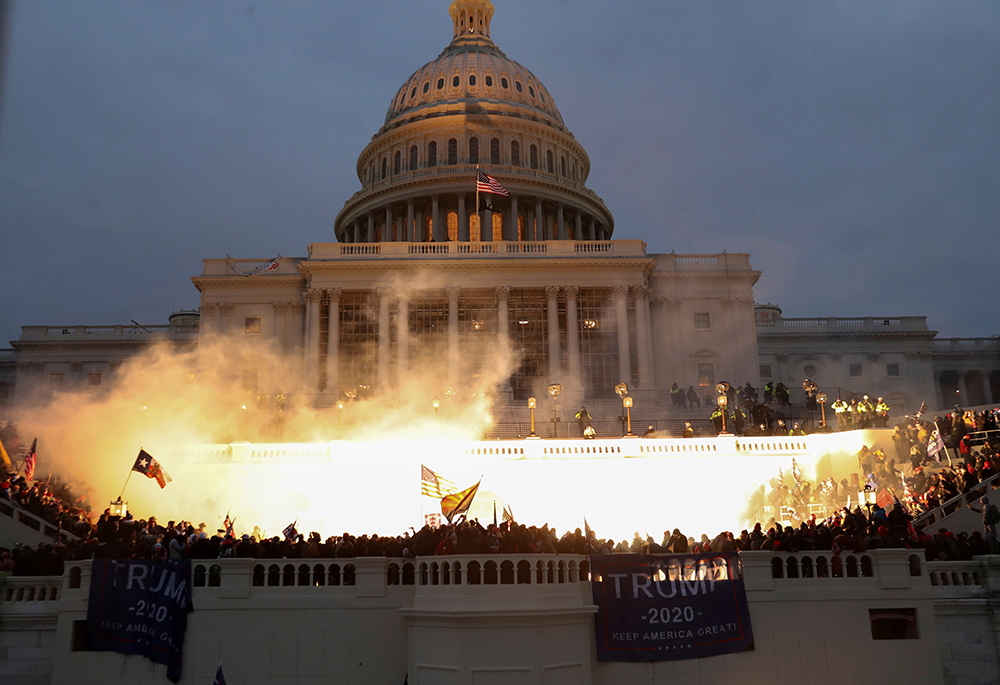 Police munition cause an explosion at the U.S. Capitol in Washington while supporters of then-President Donald Trump breach the building Jan. 6, 2021. (OSV News/Reuters/Leah Millis)