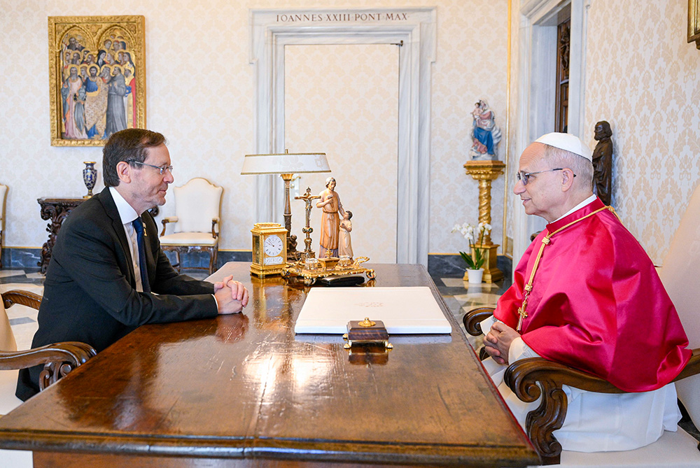 Pope Leo XIV and Israeli President Isaac Herzog meet in the library of the Apostolic Palace at the Vatican Sept. 4, 2025. (CNS/Vatican Media)
