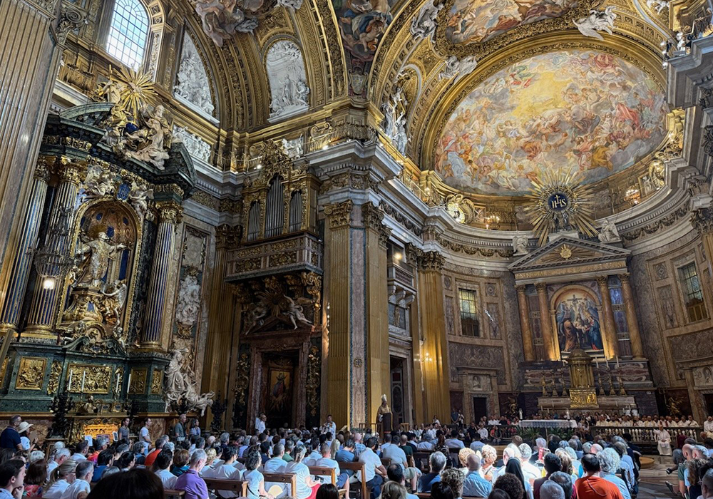 LGBTQ Catholics, their family, friends and people who minister with them attend a Jubilee Mass in Rome's Church of the Gesù Sept. 6, 2025, before walking in procession through the Holy Door of St. Peter's Basilica at the Vatican. (CNS/Courtesy of Outreach, Jack Consolie)