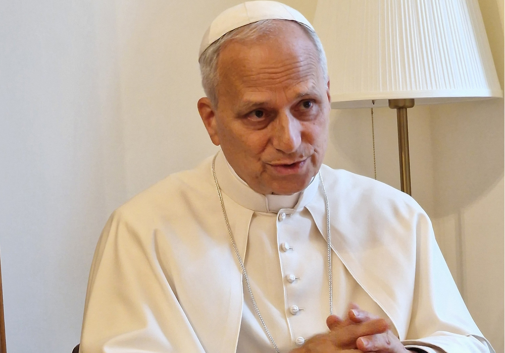 Pope Leo XIV answers a question from Elise Allen, senior correspondent at Crux, during an interview at the pope's residence inside the Vatican's Palazzo Sant'Uffizio July 30, 2025. The biography of the pope is titled, "Leo XIV: Citizen of the World, Missionary of the XXI Century," and it will be published in Spanish by Penguin Peru Sept. 18. English and Portuguese editions of the book will be released in early 2026. (CNS/Courtesy of Crux)