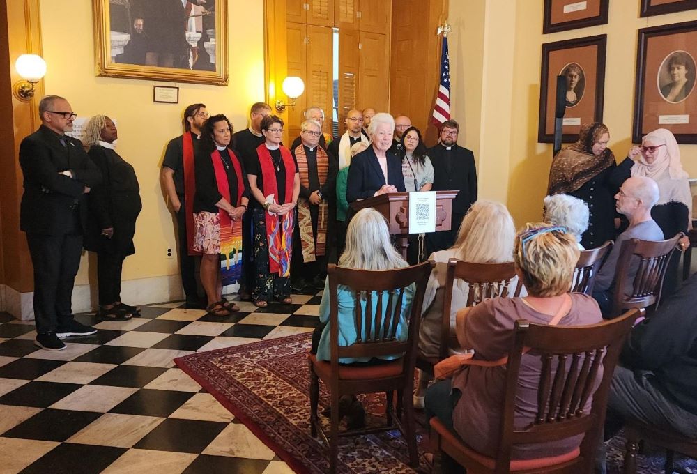 Dominican Sr. of Peace Gemma Doll and other clergy at press conference 