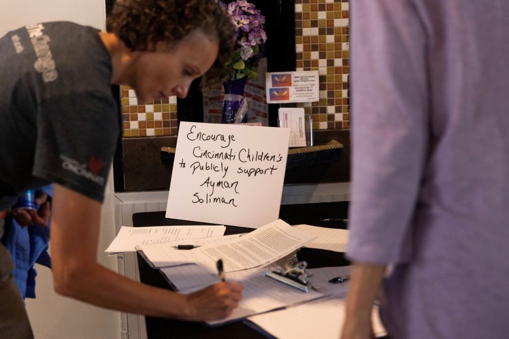 Supporters attend an interfaith service in support of Ayman Soliman, a chaplain at Cincinnati Children's Hospital who is in ICE detention. (ProPublica/Maddie McGarvey)