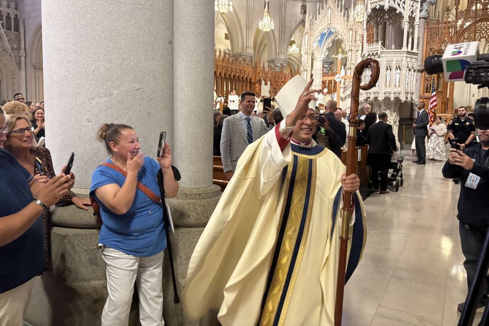 Auxiliary Bishop Bismarck Chau of Newark blesses the assembly at Cathedral Basilica of the Sacred Heart.