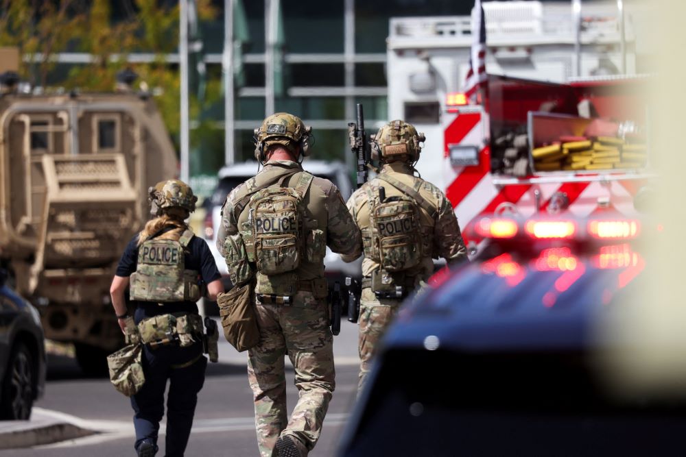 Law enforcement officers work at the crime scene at Utah Valley University where U.S. right-wing activist Charlie Kirk was fatally shot during an event in Orem Sept. 10. (OSV News/Reuters/Jim Urquhart)