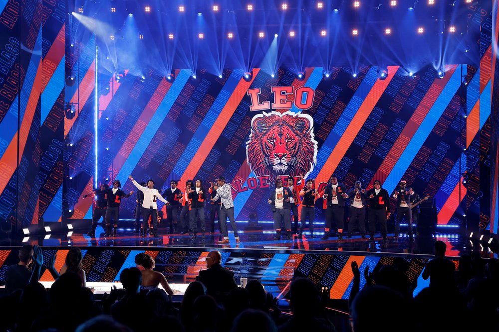 Music artist Aloe Blacc and the Leo High School Choir sing on stage during the 20th season finale of the talent competition series "America's Got Talent" Sept. 24. (OSV News/Trae Patton, NBC)