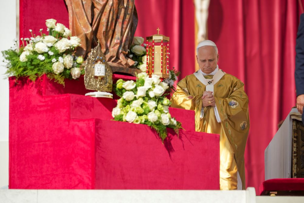 Relics of Carlo Acutis and Pier Giorgio Frassati, left, are displayed during their canonization Mass celebrated by Pope Leo XIV in St. Peter's Square at the Vatican Sept. 7. (AP/Andrew Medichini)