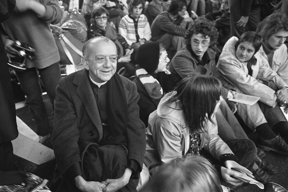 Helder Camara sitting in a crowd