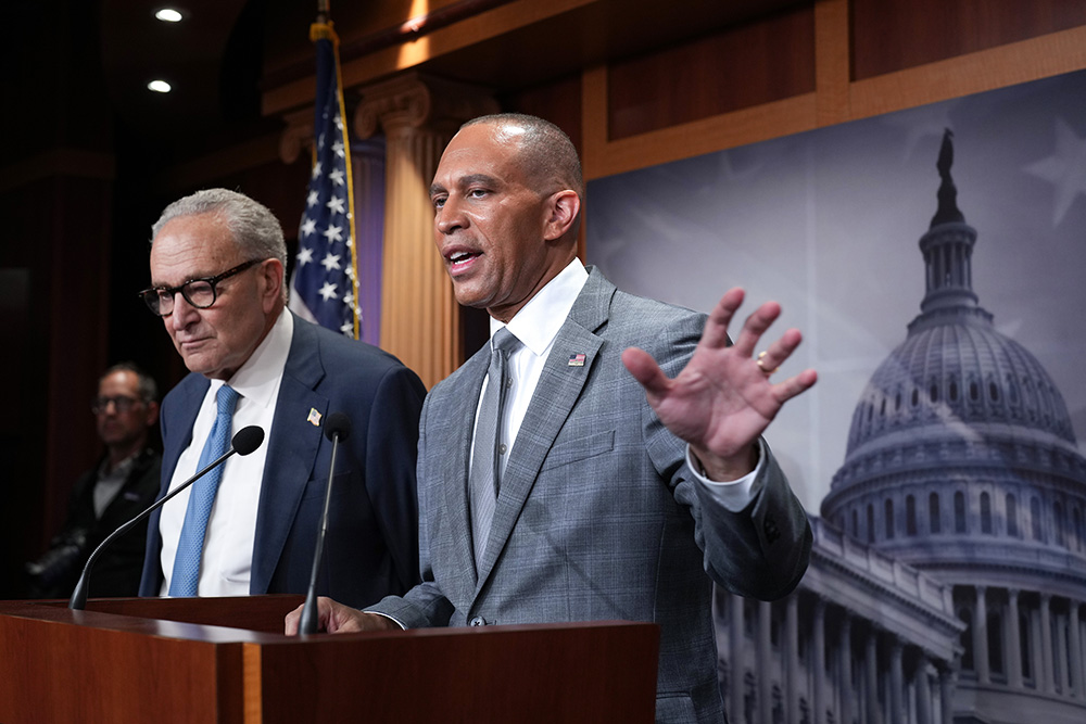 Senate Minority Leader Chuck Schumer, D-N.Y., and House Minority Leader Hakeem Jeffries, D-N.Y., right, talk with reporters following their meeting with President Donald Trump and Republican leaders on the government funding crisis, at the Capitol in Washington Sept. 29, 2025. (AP/J. Scott Applewhite)