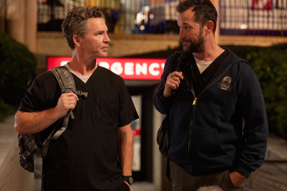 In one stirring episode, Dr. Robinavitch, or "Robby," (Noah Wyle) reads aloud a letter written by Dr. Abbott (Shawn Hatosy) to the relative of a deceased patient, demonstrating the power of the quiet act of bearing witness to grief. (Warrick Page/HBO Max)