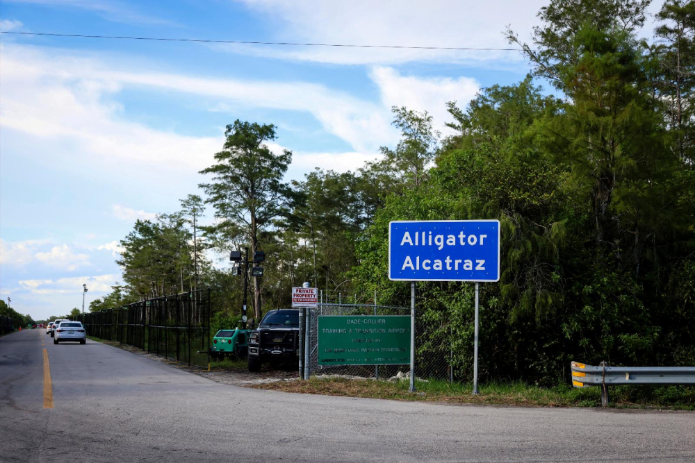 A sign is seen at the entrance of "Alligator Alcatraz" Immigration and Customs Enforcement, ICE, detention center in the Dade-Collier Training and Transition Airport in Ochopee, Fla., Aug. 3, 2025. (OSV News/Reuters/Marco Bello)