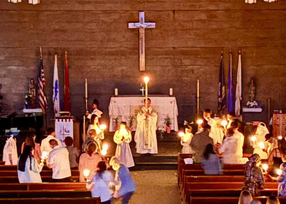 Fr. Britanico, Naval Air Station Lemoore, conducting Easter services. (Courtesy of RP2 Brian Wilson, NAS Lemoore)