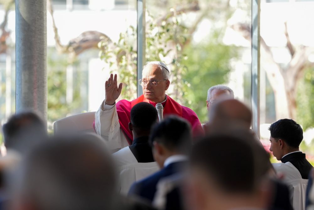 Pope Leo XIV delivers his blessing at the conclusion of a prayer service at a greenhouse that is part of Borgo Laudato Si' in Castel Gandolfo.