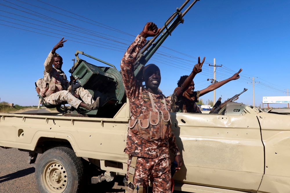 Soldiers in Sudan's army celebrate after entering Wad Madani, Sudan, Jan. 12. (OSV News/Reuters/El Tayeb Siddig)