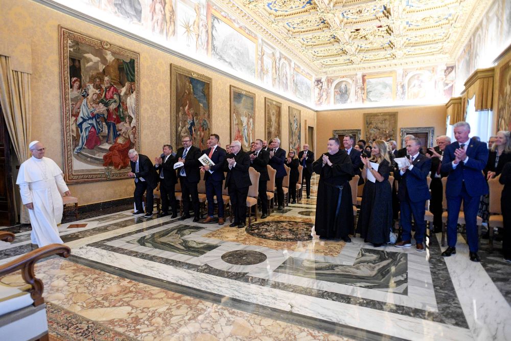 Pope Leo XIV arrives for an audience at the Vatican Oct. 9 with labor union leaders from Chicago making a Jubilee pilgrimage to Rome. (CNS/Vatican Media)