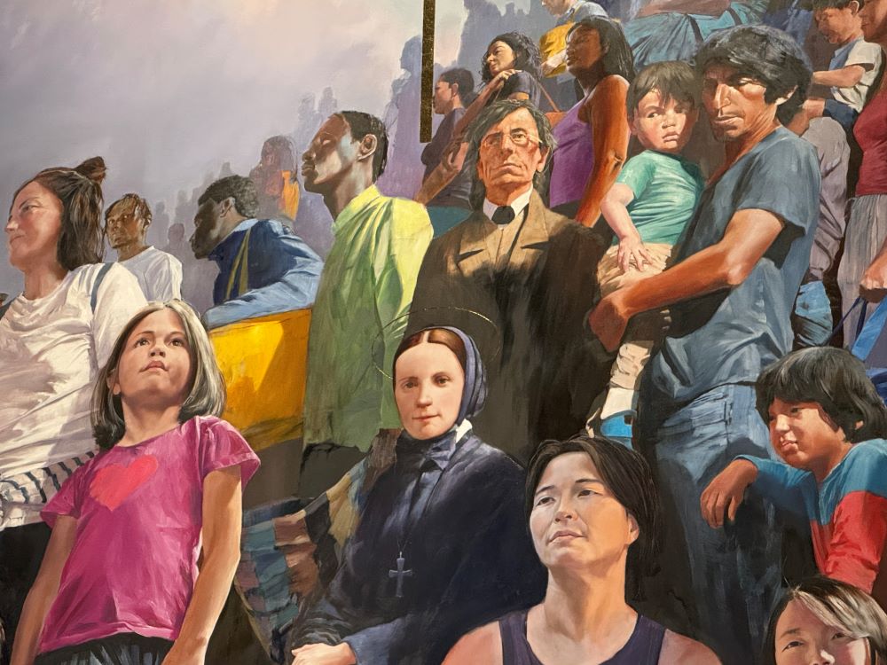 Mother Cabrini is featured in a mural featuring migrants. 