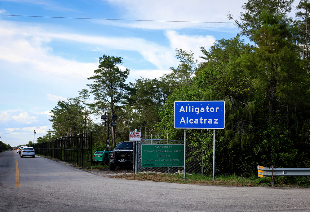 A sign is seen at the entrance of "Alligator Alcatraz" Immigration and Customs Enforcement, ICE, detention center in the Dade-Collier Training and Transition Airport in Ochopee, Florida, Aug. 3, 2025. (OSV News/Reuters/Marco Bello)