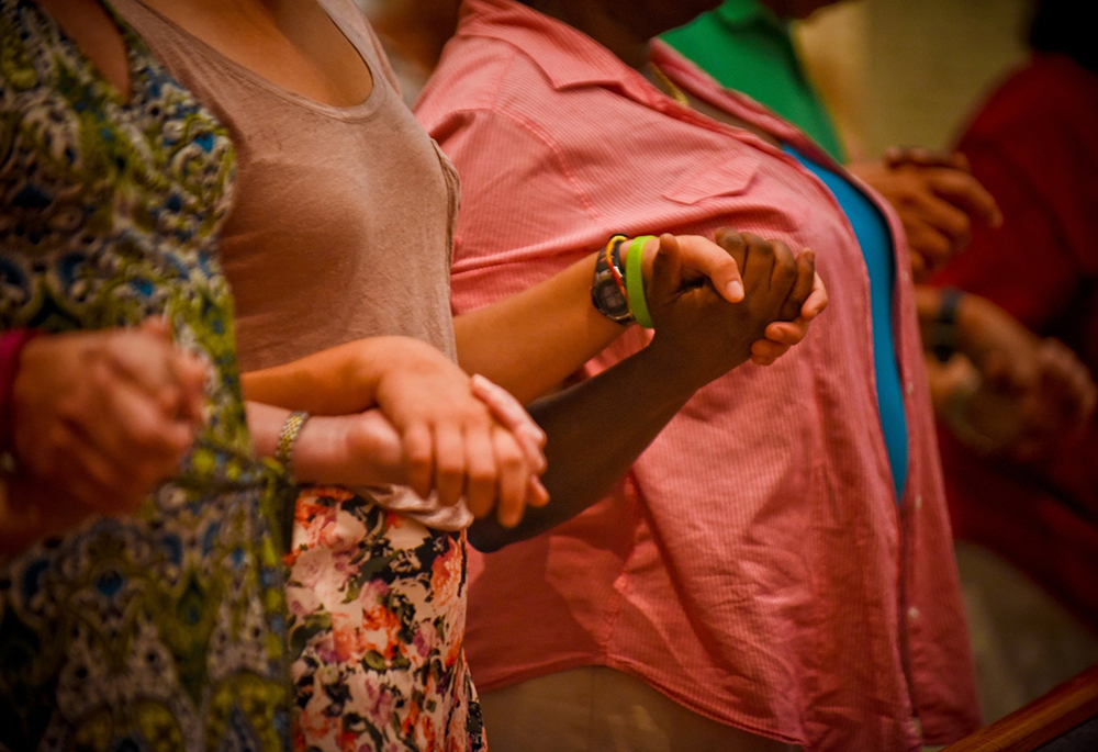 Congregants are pictured in a U.S. parish praying for peace, in a file photo. (OSV News/Catholic Herald/Juan C. Medina)