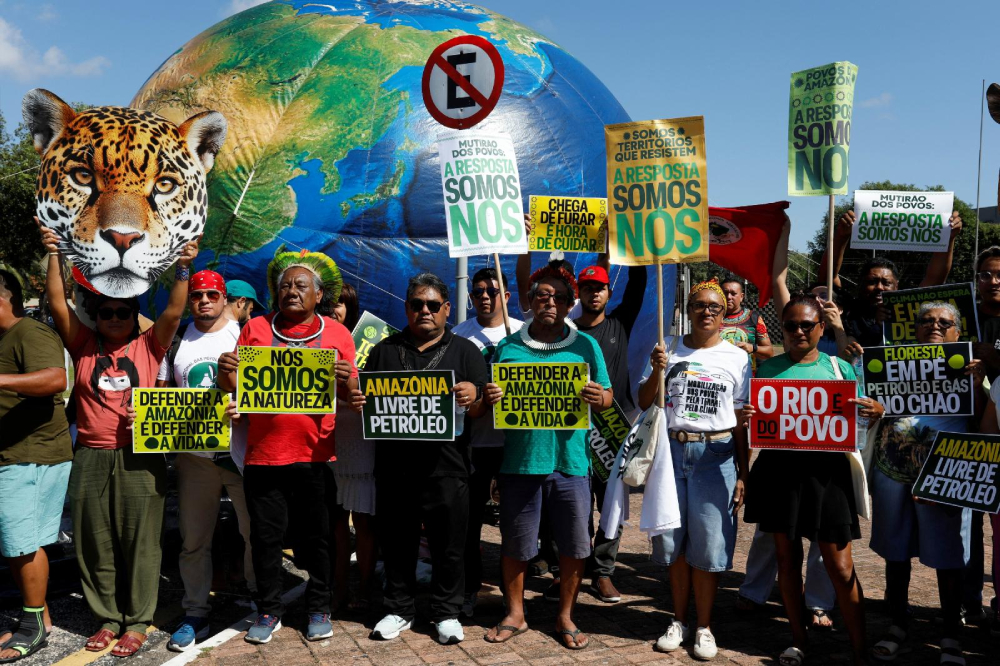 People attend a protest in Belem, Brazil, July 23, 2025, advocating for climate justice months ahead of U.N. Climate Change Conference, COP30, that Belem will be hosting in November. (OSV News/Reuters/Wagner Santana)