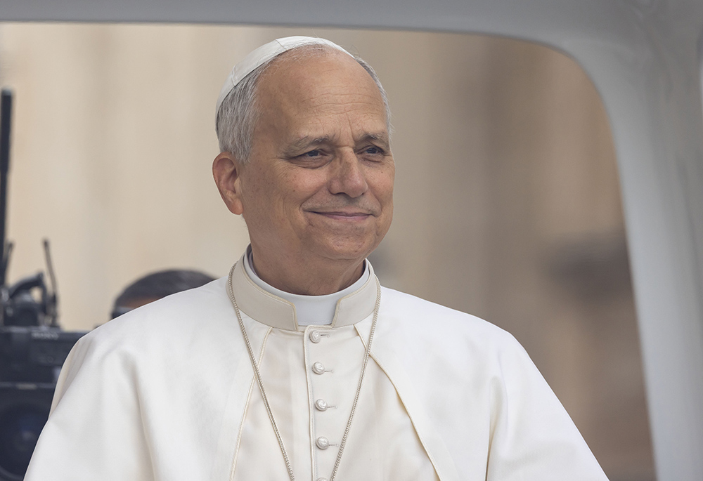 Pope Leo XIV smiles as he rides the popemobile around St. Peter's Square at the Vatican before his weekly general audience Sept. 24, 2025. (CNS/Pablo Esparza)