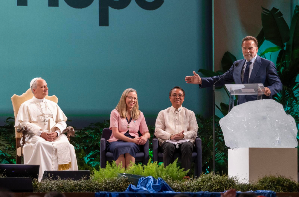 Arnold Schwarzenegger, actor and former California governor, speaks in the presence of Pope Leo XIV during the opening session of an international conference celebrating the 10th anniversary of Pope Francis' encyclical "Laudato Si', on Care for Our Common Home," at the Mariapolis Center in Castel Gandolfo, Italy, Oct. 1, 2025. (CNS/Pablo Esparza)