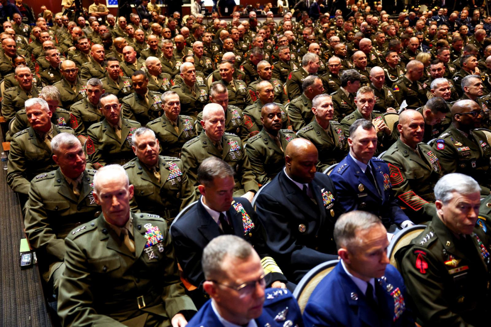 Members of the military wait for the U.S. President Donald Trump speech, as they attend a meeting convened by U.S. Defense Secretary Pete Hegseth, at Marine Corps Base Quantico in Virginia Sept. 30, 2025. In an unprecedented gathering, almost 800 generals, admirals and their senior enlisted leaders were ordered into one location from around the world on short notice. (OSV News/Reuters/Kevin Lamarque)