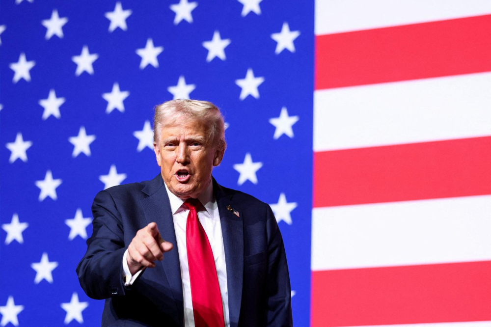 U.S. President Donald Trump gestures after speaking during a meeting of senior military leaders convened by U.S. Defense Secretary Pete Hegseth, at Marine Corps Base Quantico in Virginia Sept. 30, 2025. In an unprecedented gathering, almost 800 generals, admirals and their senior enlisted leaders were ordered into one location from around the world on short notice. (OSV News/Reuters/Kevin Lamarque)
