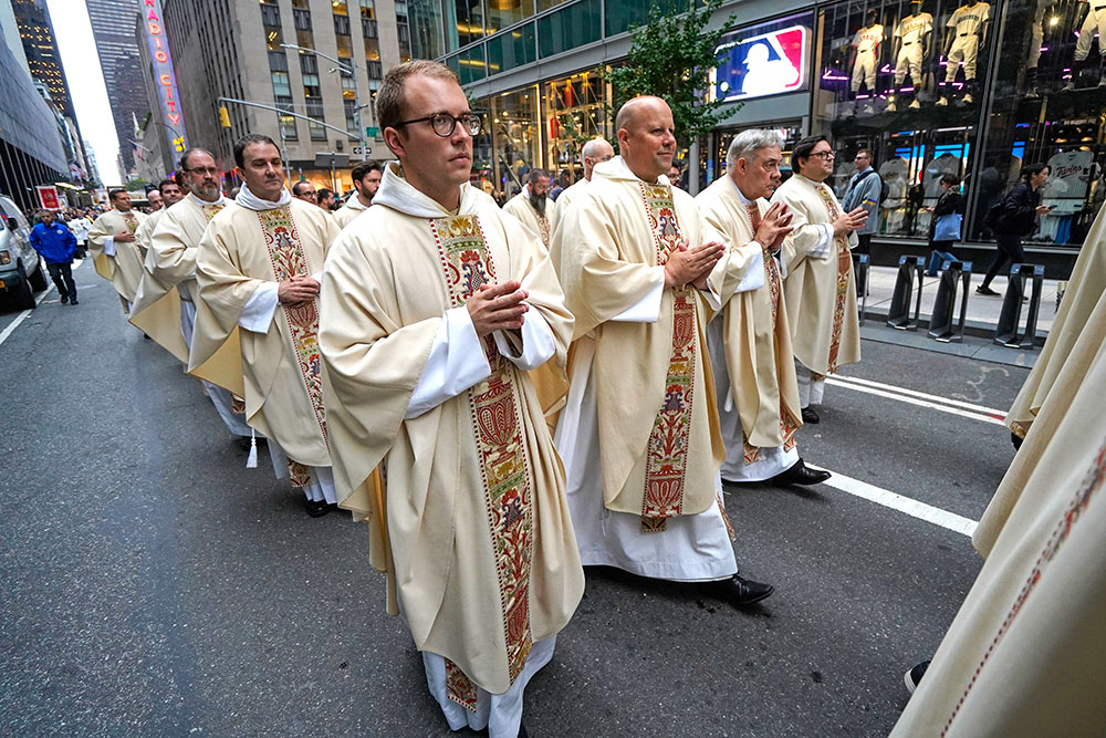 Priests participate in the fifth annual Napa Institute-sponsored Eucharistic procession through the Midtown Manhattan section of New York City Oct. 14, 2025. (OSV News/Gregory A. Shemitz)