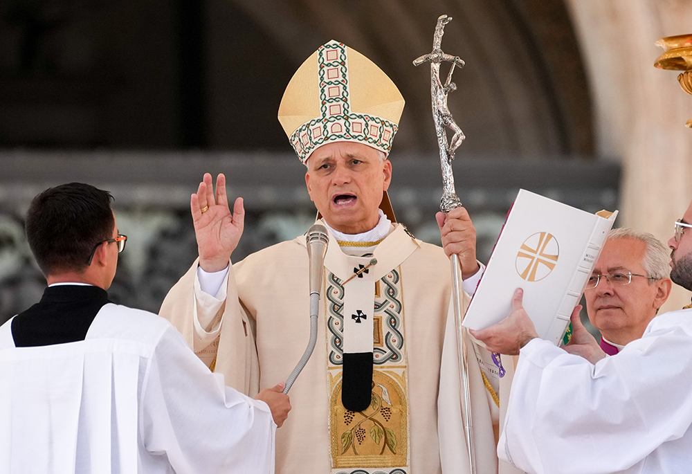 Pope Leo XIV gives his blessing at the conclusion of his Mass for the canonization of seven new saints in St. Peter's Square at the Vatican Oct. 19, 2025. (CNS/Lola Gomez)