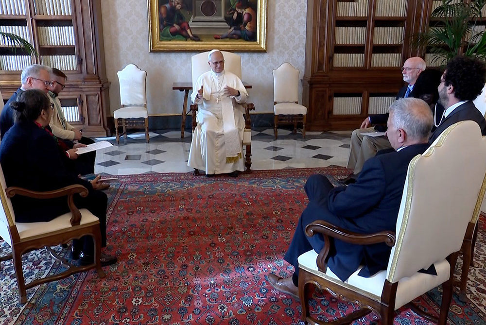 Pope Leo XIV is seen in a video clip meeting with members of the board of Ending Clergy Abuse, a coalition of survivors and human rights advocates working to end clergy abuse, enforce accountability and promote justice and truth, during an audience in the library of the Apostolic Palace at the Vatican Oct. 20, 2025. Also present is Pedro Salinas, a Peruvian journalist and abuse survivor. (CNS/screengrab from Vatican Media video)