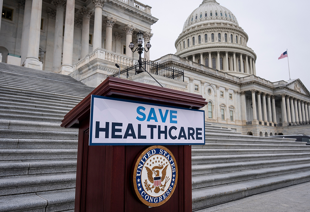 House Democrats prepare to speak on the steps of the Capitol to insist that Republicans include an extension of expiring health care benefits as part of a government funding compromise, in Washington, Sept. 30, 2025. (AP photo/J. Scott Applewhite)