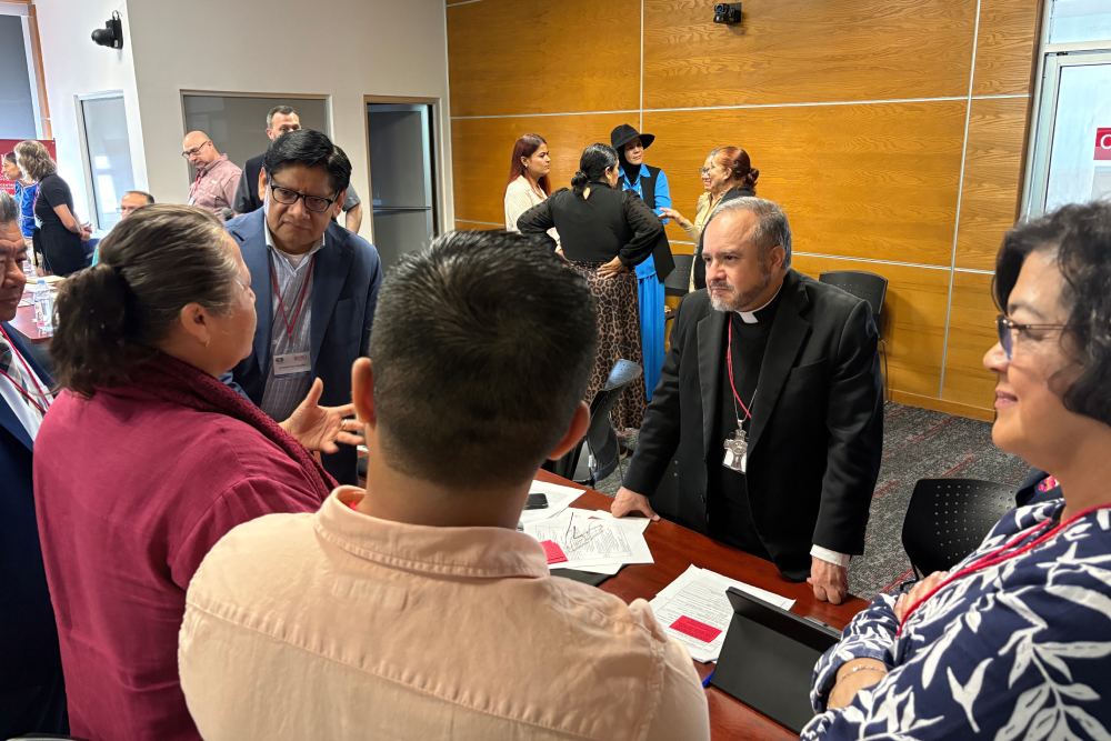 Theologians, ministers, activists, and bishops participated in dialogue and communal reflection at the Colloquium on Migration and Theology held in Tijuana, Mexico. (Luis Donaldo González)
