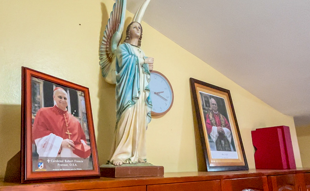 Pictures of Robert Prevost as a cardinal and as Pope Leo XIV adorn the sacristy in Our Lady of Montserrat Parish in Trujillo, Peru. (NCR photo/Justin McLellan)