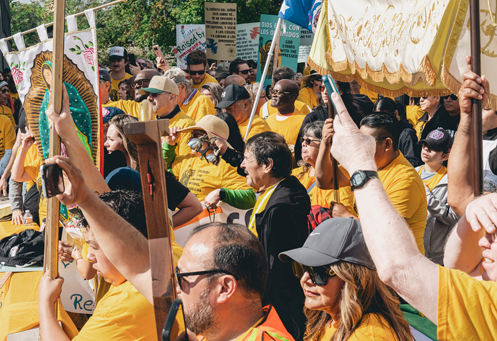 About 1,000 Catholic activists march Saturday, Oct. 11 in Chicago to bring Communion to detainees at the Broadview ICE processing center. (Courtesy of Coalition for Spirituality and Public Leadership)
