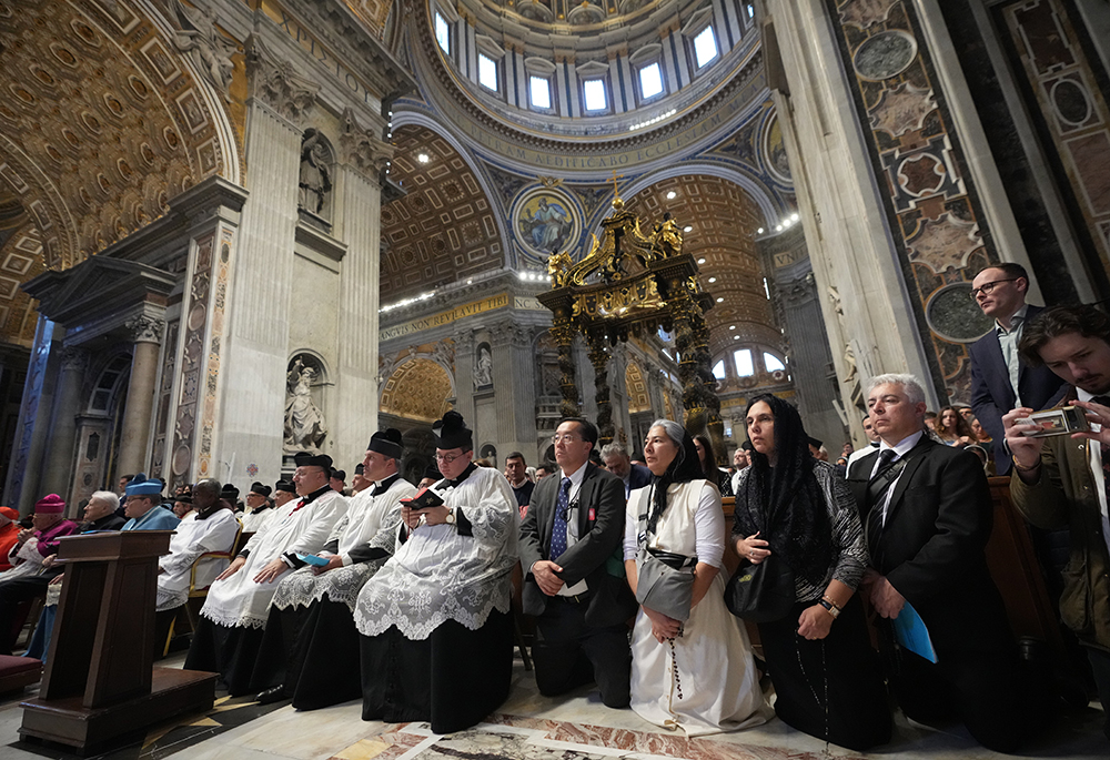 Faithful pray as Cardinal Raymond Burke celebrates an old Latin Mass for pilgrims in St. Peter's Basilica, at the Vatican, Oct. 25, 2025. (AP photo/Alessandra Tarantino)