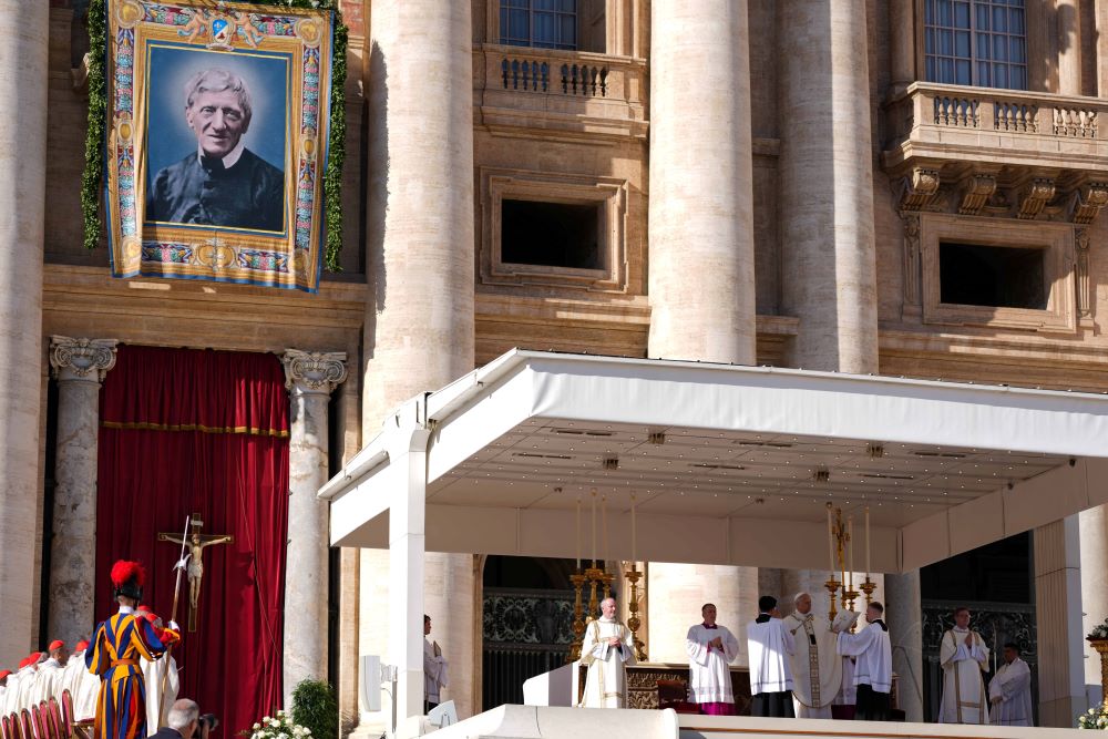 Pope Leo XIV celebrates Mass in St. Peter's Square at the Vatican Nov. 1 beneath a tapestry of St. John Henry Newman. 