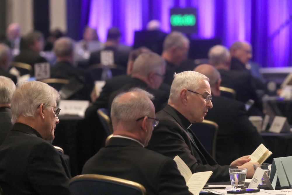 Bishops pray during a Nov. 12, 2025, session of the fall general assembly of the U.S. Conference of Catholic Bishops in Baltimore.