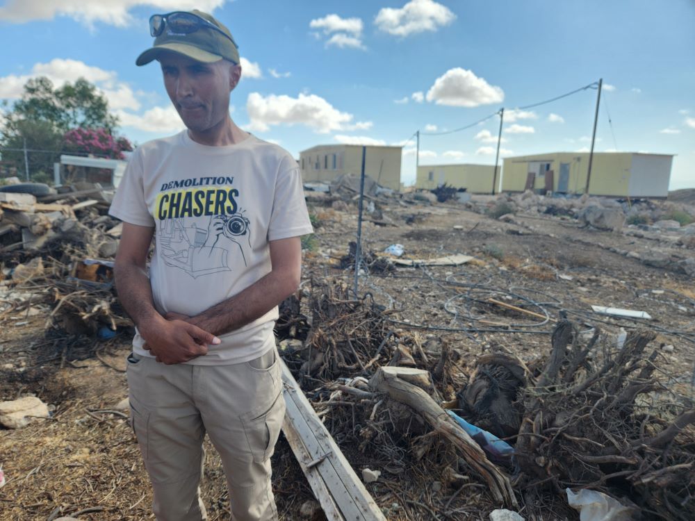 Eid Hathaleen stands.