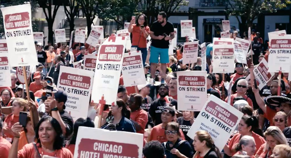 A crowd supports workers during a 2018 Chicago hotel strike. 