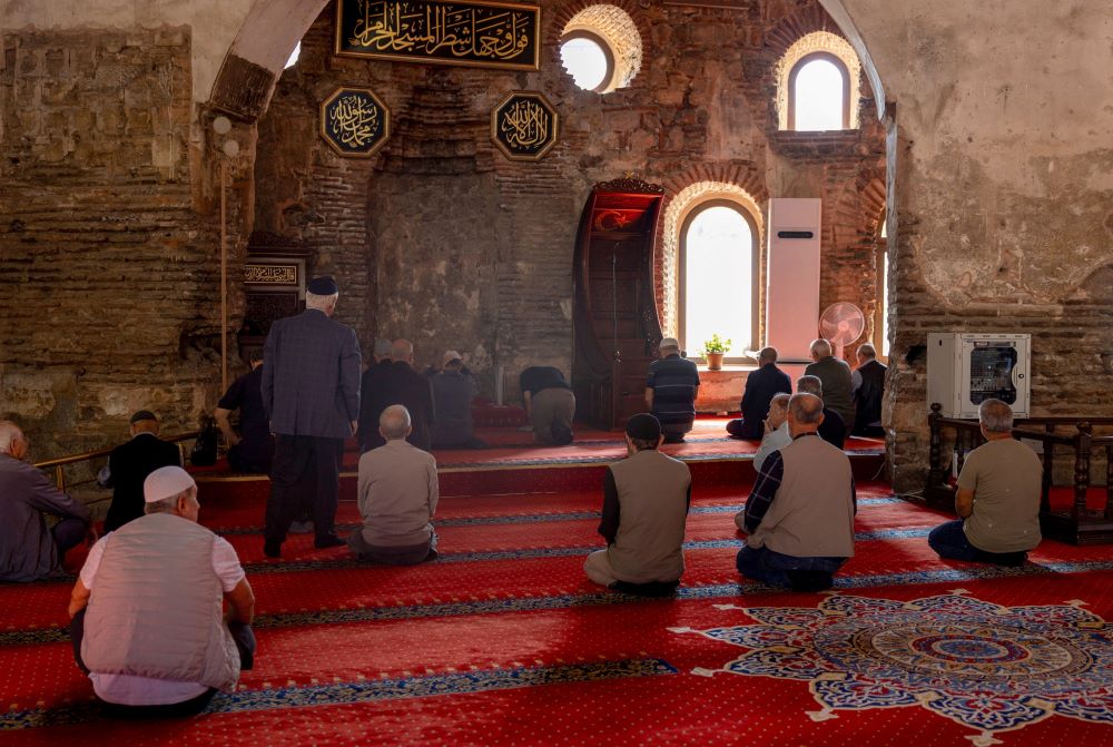 Worshippers attend a noon prayer at Hagia Sophia Mosque in Iznik, Turkey. 