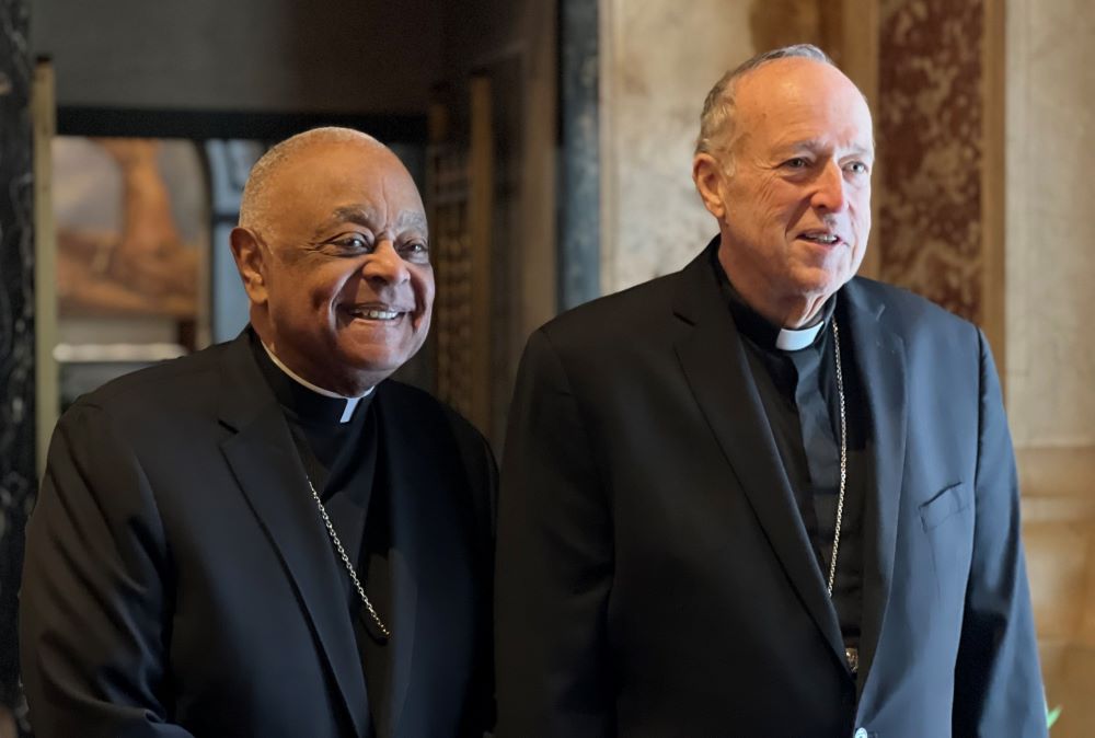 Washington Cardinal Wilton Gregory and Cardinal Robert McElroy leave a Jan. 6, 2025, news conference at the Cathedral of St. Matthew the Apostle in Washington.
