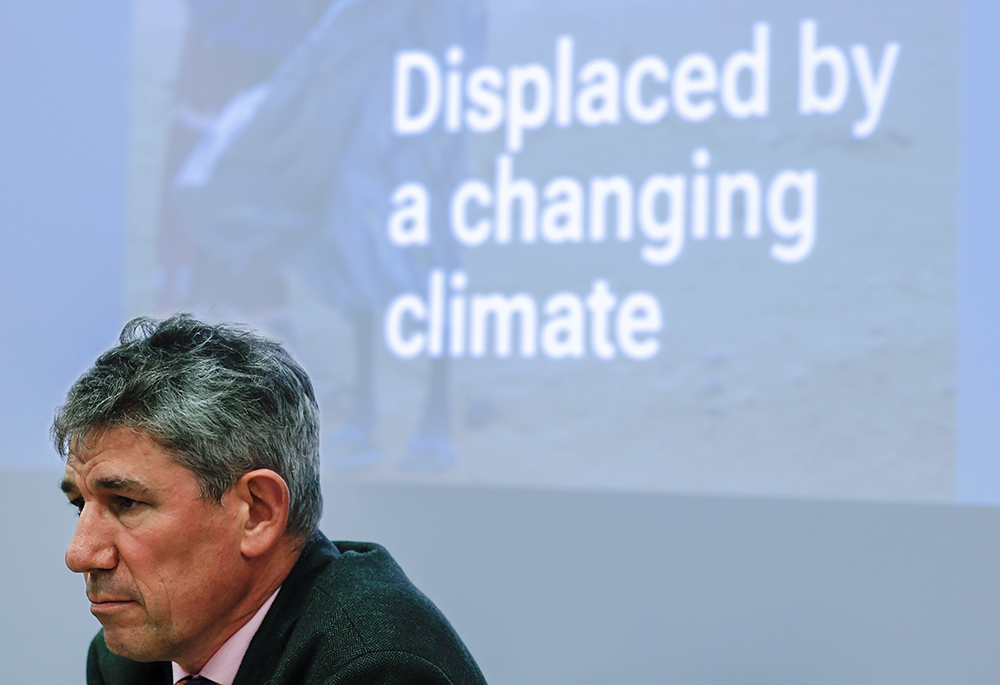 Alistair Dutton, Caritas Internationalis secretary general, reflects during a press conference in Rome Oct. 26, 2023, launching the organization's report on climate change and displacement. (CNS/Lola Gomez)