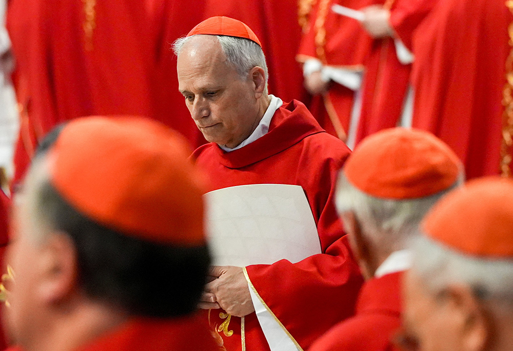 Chicago-born then-Cardinal Robert F. Prevost, then-prefect of the Dicastery for Bishops under Pope Francis, processes at the beginning of the Mass on the fifth day of the "novendiali," nine days of mourning for the late pope, in St. Peter’s Basilica at the Vatican April 30, 2025. (CNS/Lola Gomez)