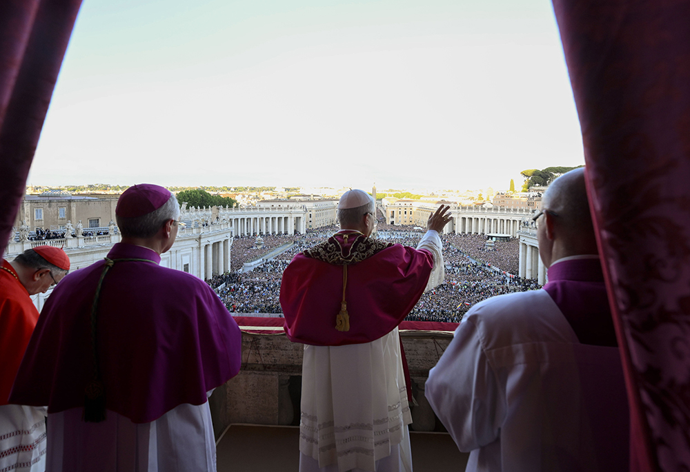 Pope Leo XIV, the former Cardinal Robert Francis Prevost, waves after walking onto the central balcony of St. Peter's Basilica at the Vatican May 8, 2025, following his election during the conclave. (OSV News/Catholic Press photo/Vatican Media)