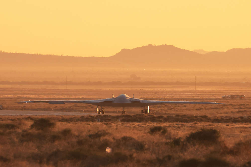 The U.S. Air Force's B-21 "Raider," the long-range stealth bomber that can be armed with nuclear weapons, rolls onto the runway at Northrop Grumman's site at Air Force Plant 42, during its first flight, in Palmdale, Calif., in this 2023 file photo. (OSV News/Reuters/David Swanson)